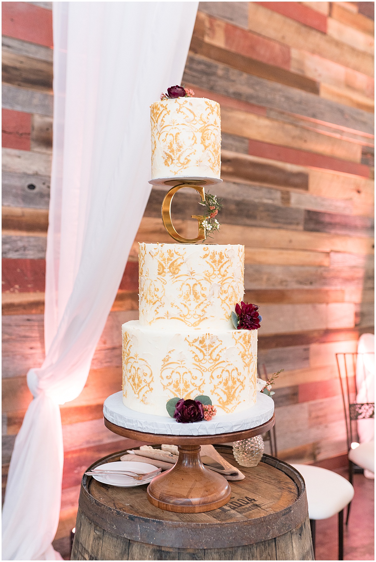 White and gold wedding cake at Finley Creek Vineyards wedding in Zionsville, Indiana