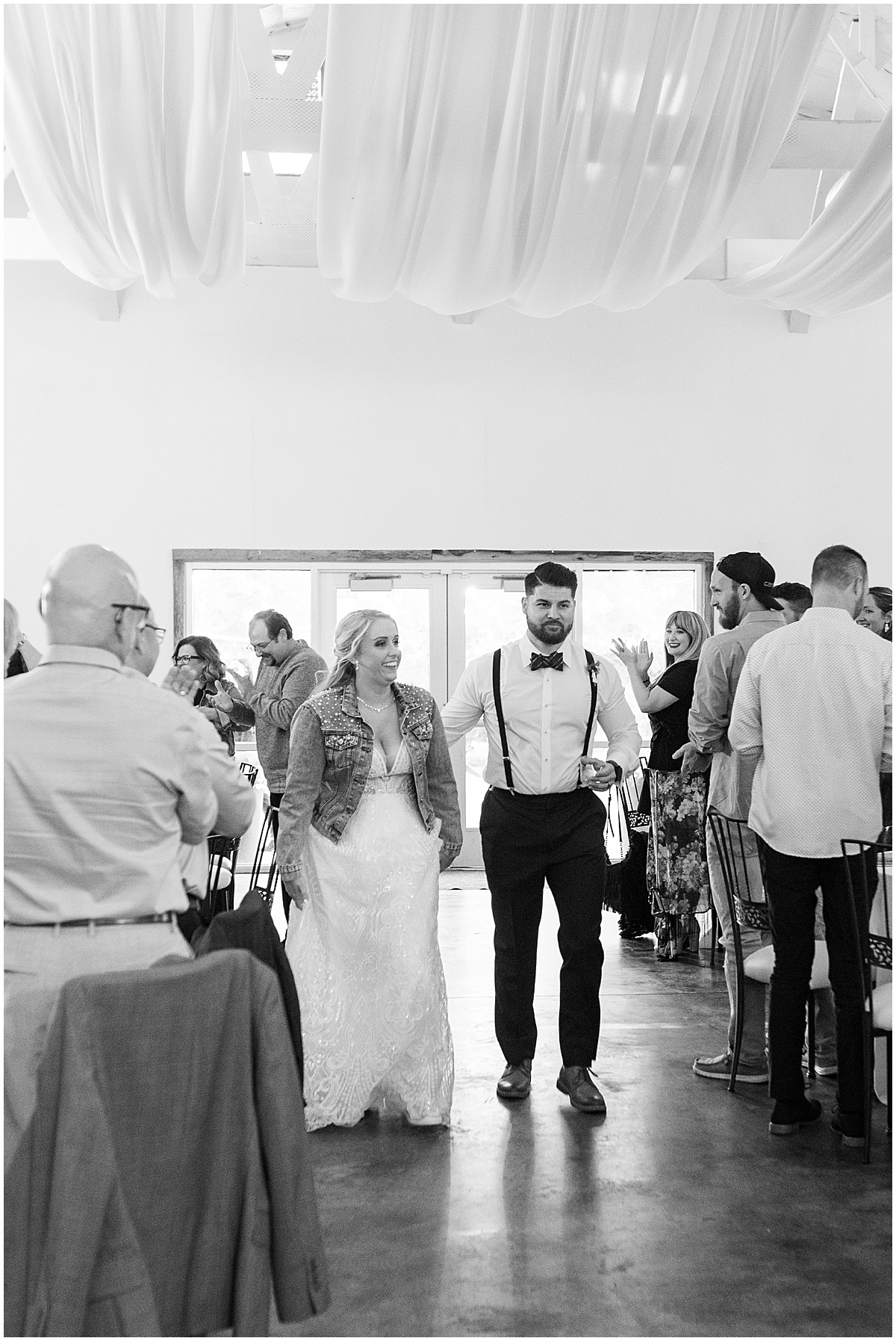 Newlyweds entrance to reception atFinley Creek Vineyards wedding in Zionsville, Indiana