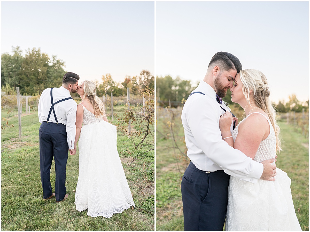 Bride and groom kiss in vineyard at Finley Creek Vineyards wedding in Zionsville, Indiana