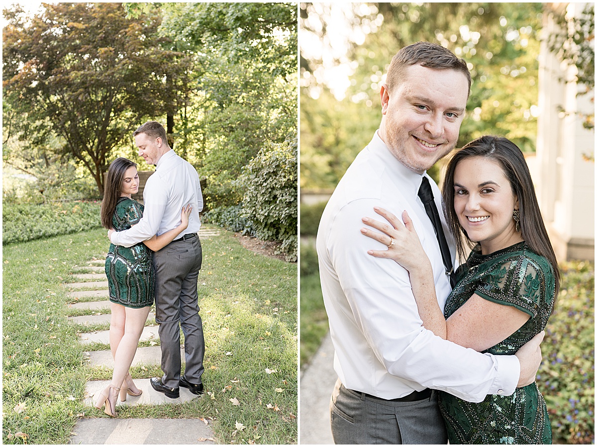 Couple hug during jewel tone engagement photos at Newfields