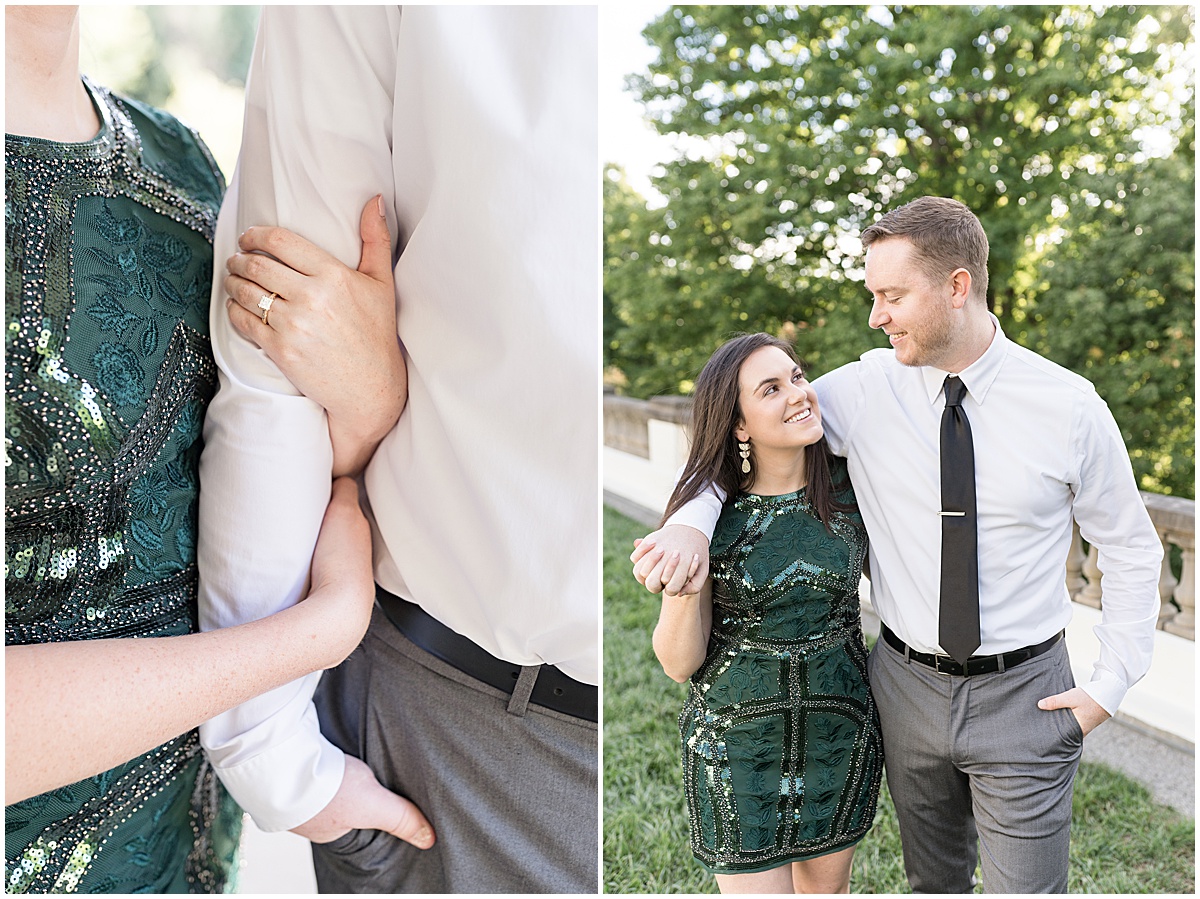 Couple holds hands at jewel tone engagement photos at Newfields