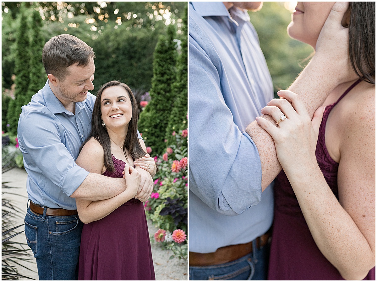 Couple hold on to each other during jewel tone engagement photos at Newfields