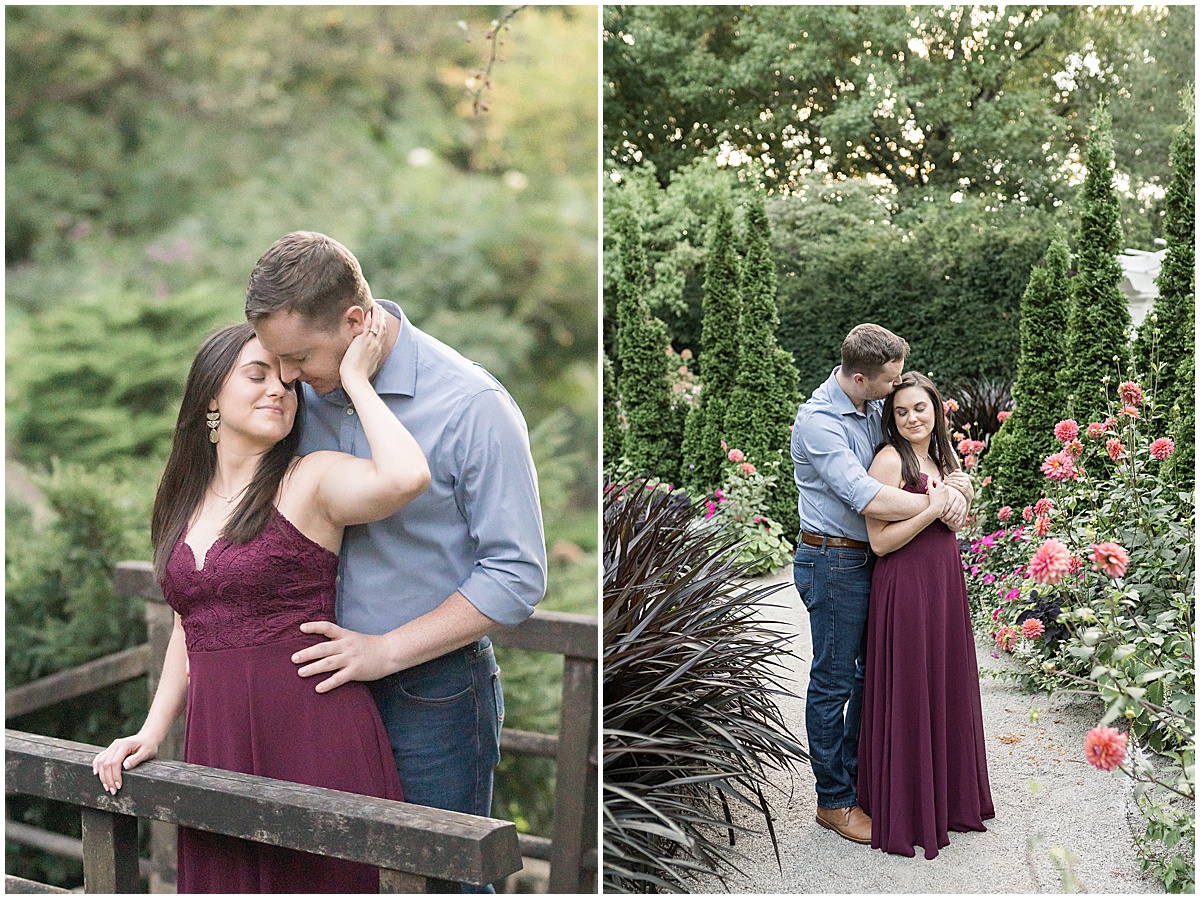 Couple hugging in garden during jewel tone engagement photos at Newfields