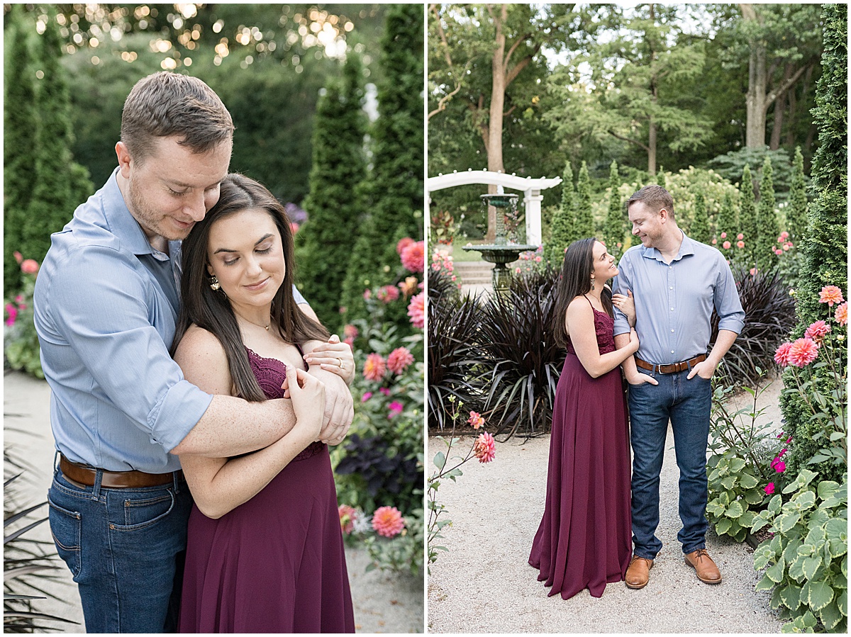 Couple hold each other at jewel tone engagement photos at Newfields