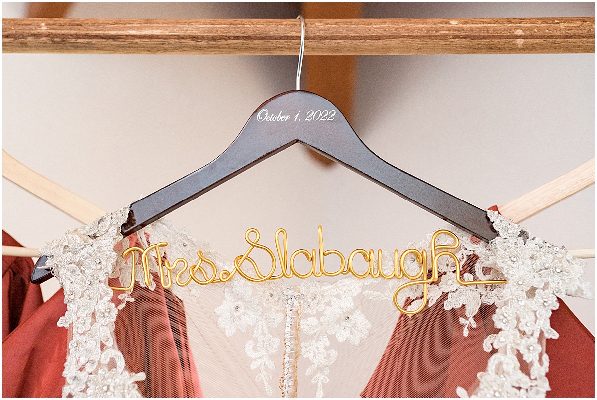 Wedding dress hanger for Miami County Fairgrounds wedding in Peru, Indiana