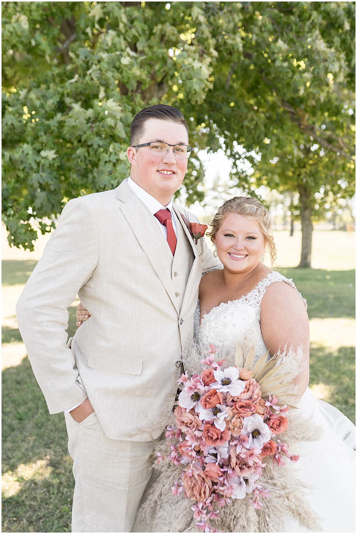 Bride and groom portrait before Miami County Fairgrounds wedding in Peru, Indiana