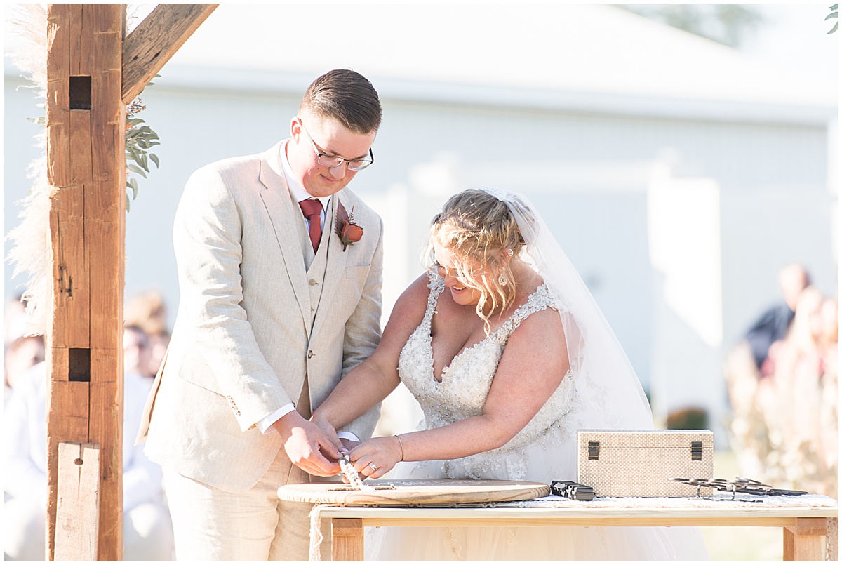 Bride and groom tie the knot during Miami County Fairgrounds wedding in Peru, Indiana