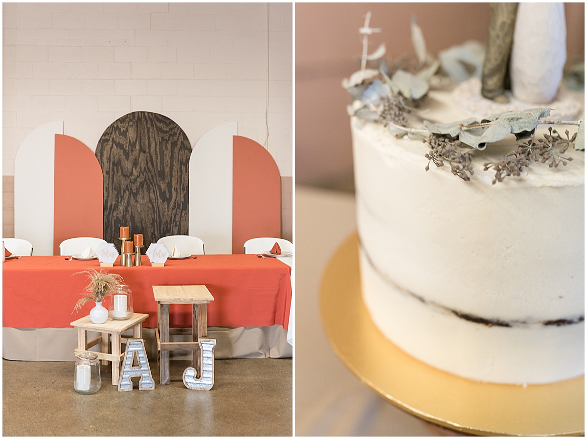 Reception decor with cake at Miami County Fairgrounds wedding in Peru, Indiana