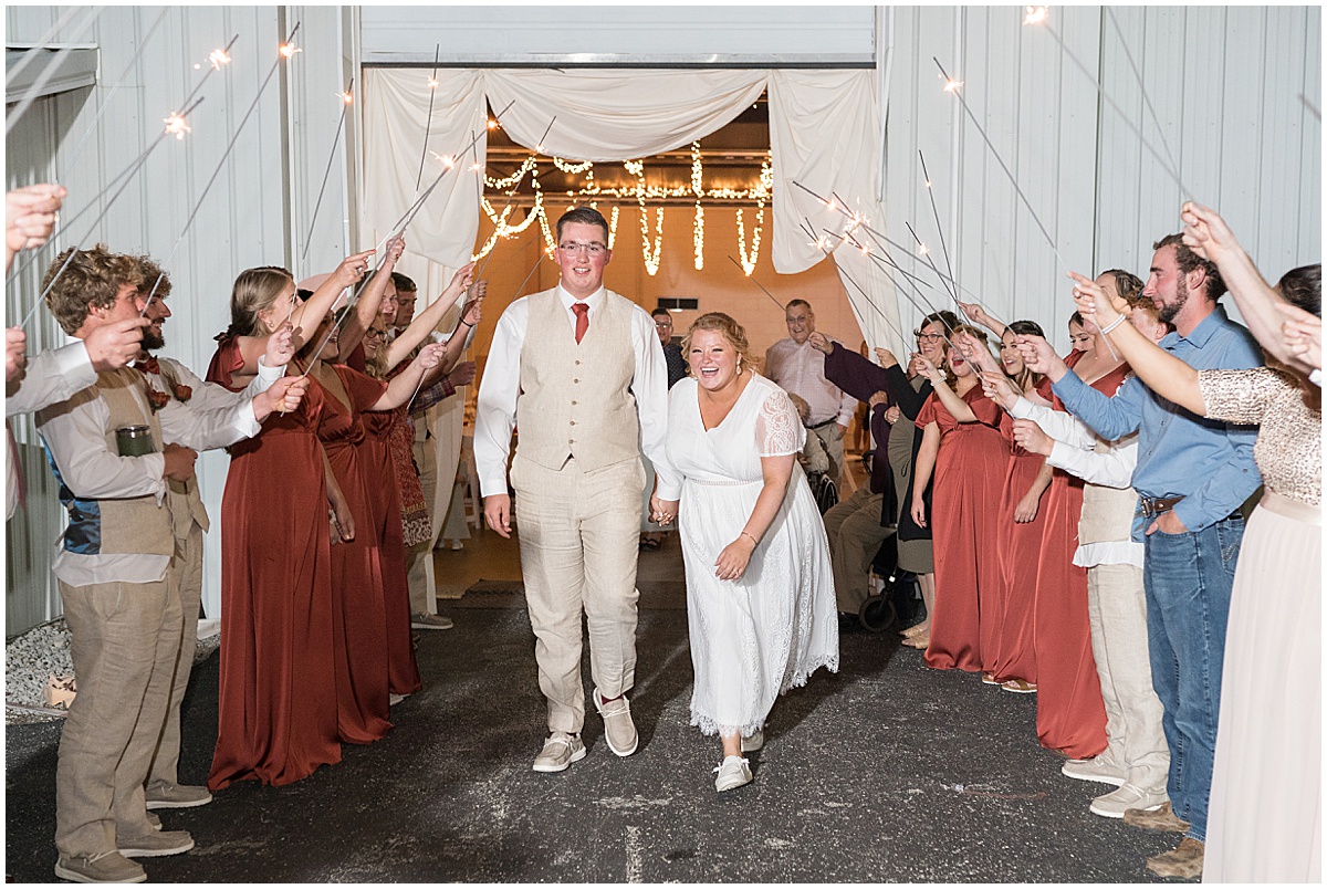 Bride and groom sparkler exit after Miami County Fairgrounds wedding in Peru, Indiana