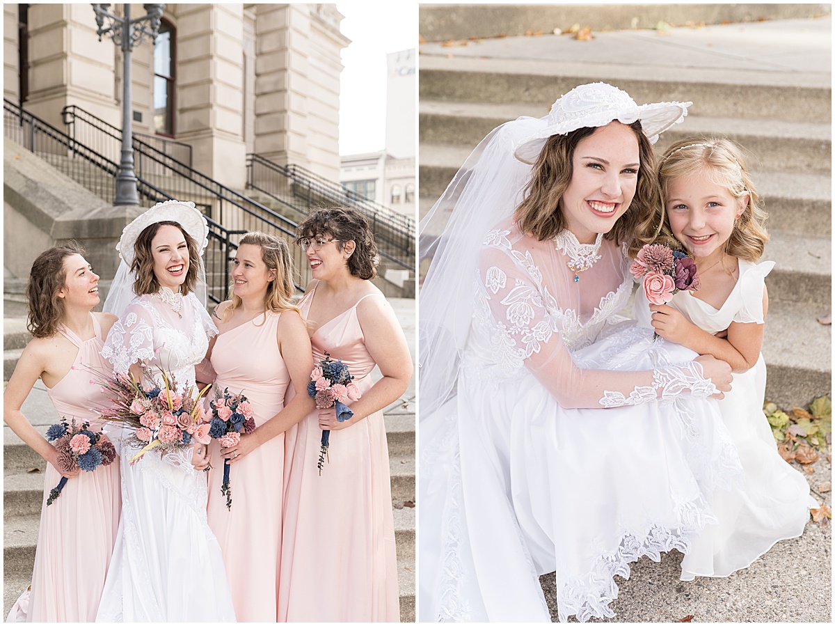 Bride with bridesmaids and flower girl during wedding photos in Downtown Lafayette, Indiana