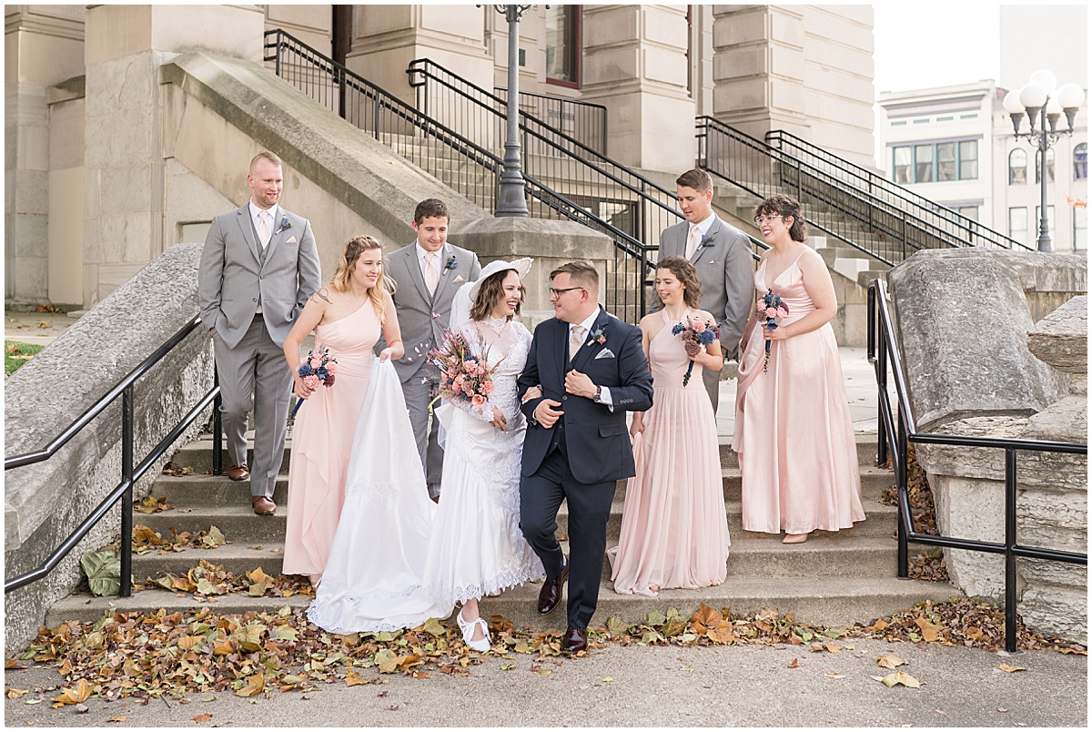Bridal party walk down Courthouse steps in Lafayette, Indiana
