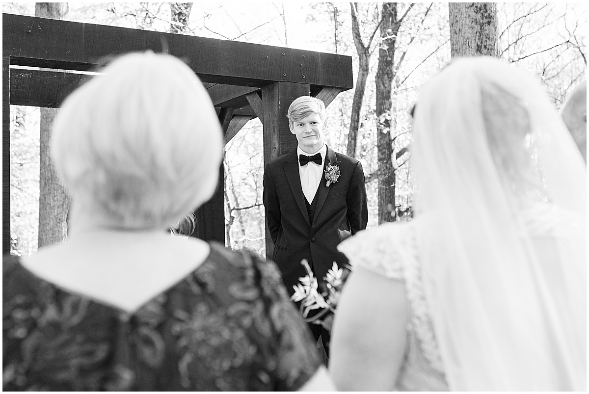 Groom seeing bride walk down the aisle at fall wedding at 3 Fat Labs in Greencastle, Indiana