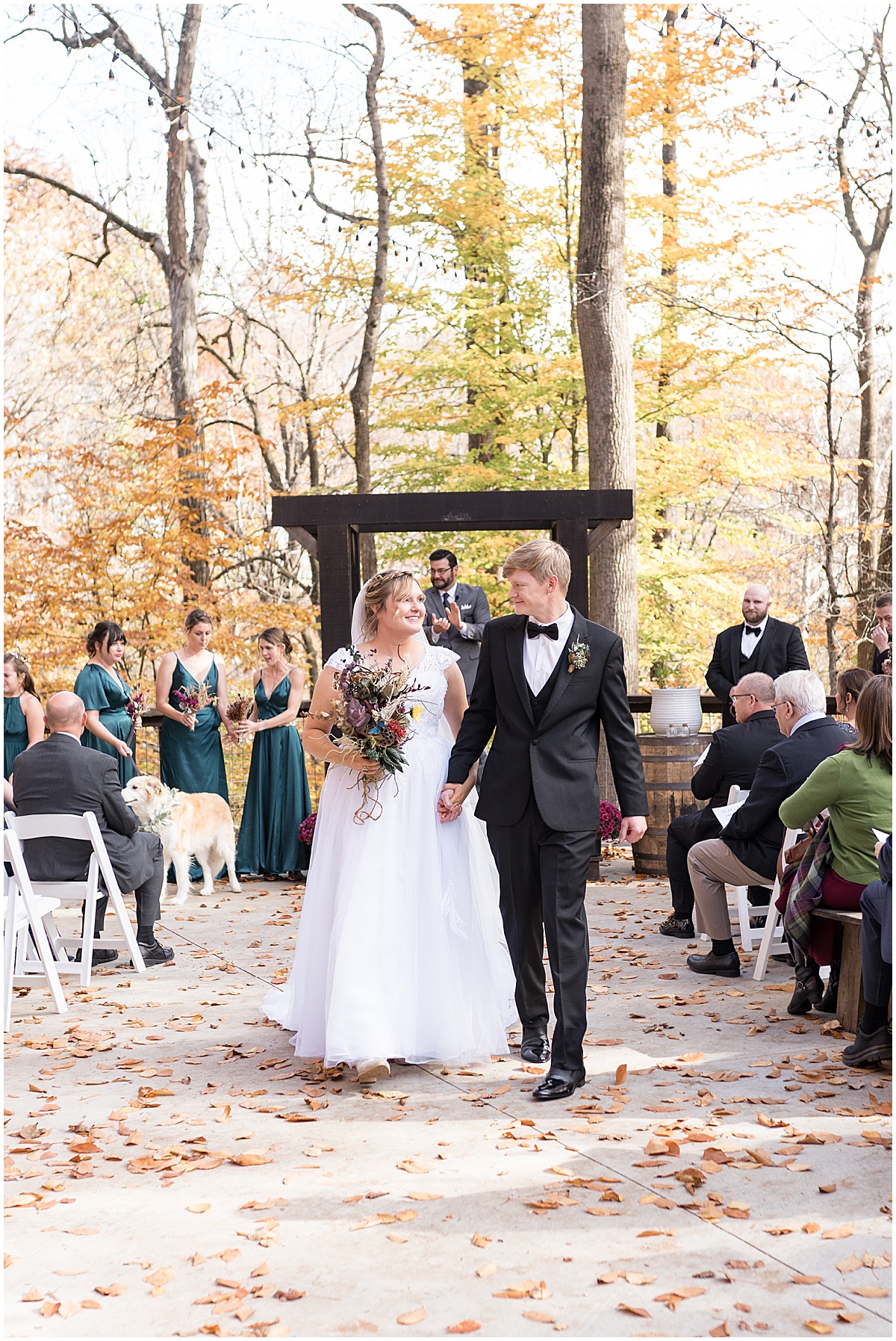 Bride and groom exit from fall wedding at 3 Fat Labs in Greencastle, Indiana