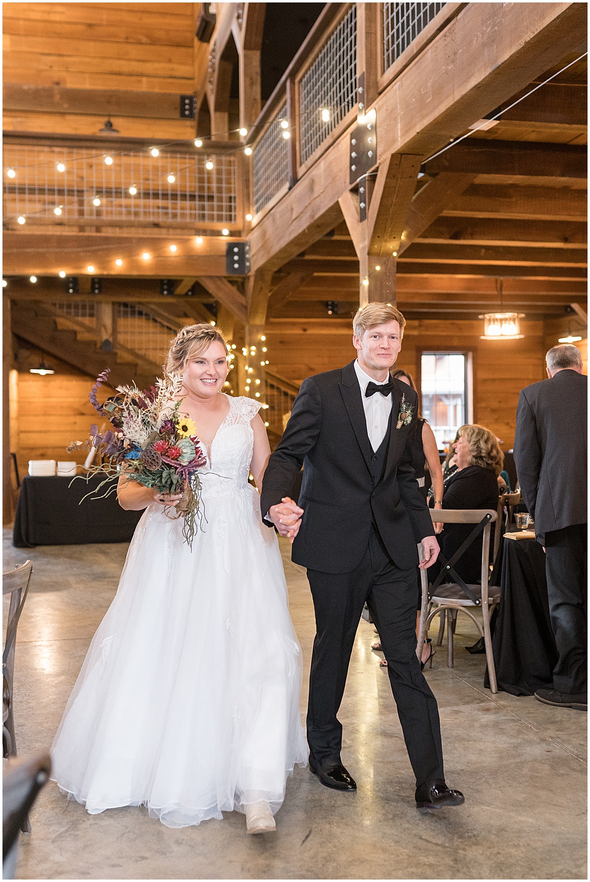 Grand entrance for fall wedding at 3 Fat Labs in Greencastle, Indiana