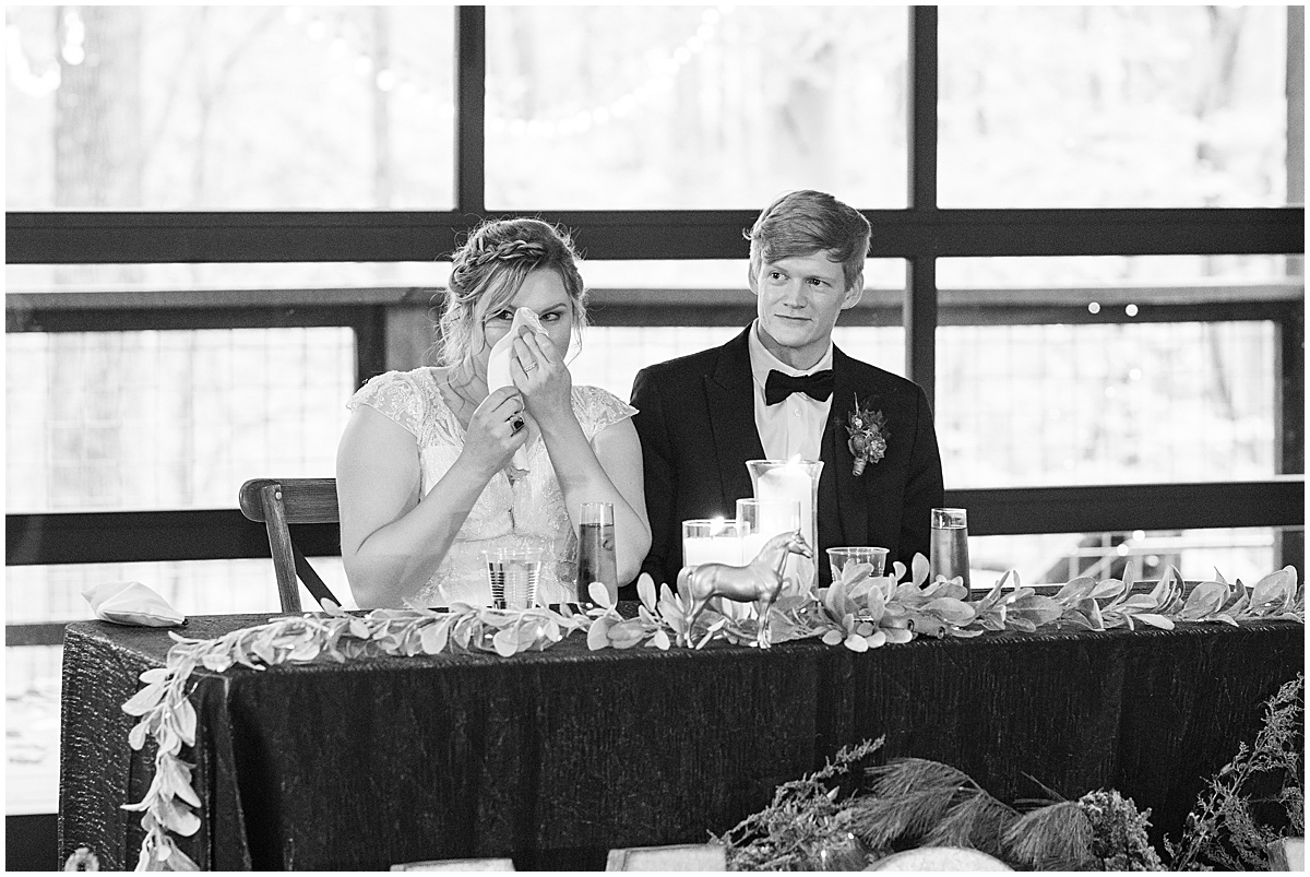 Bride reacts to emotional toast at fall wedding at 3 Fat Labs in Greencastle, Indiana