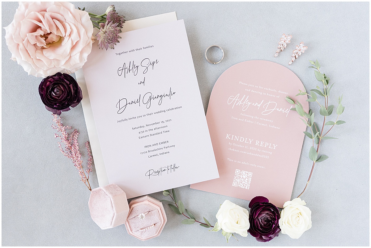 Invitation flat lay for Iron & Ember events wedding in Carmel, Indiana