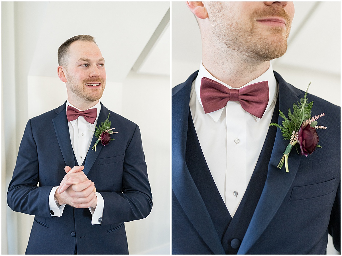 Close up of groom in navy suit before Iron & Ember events wedding in Carmel, Indiana