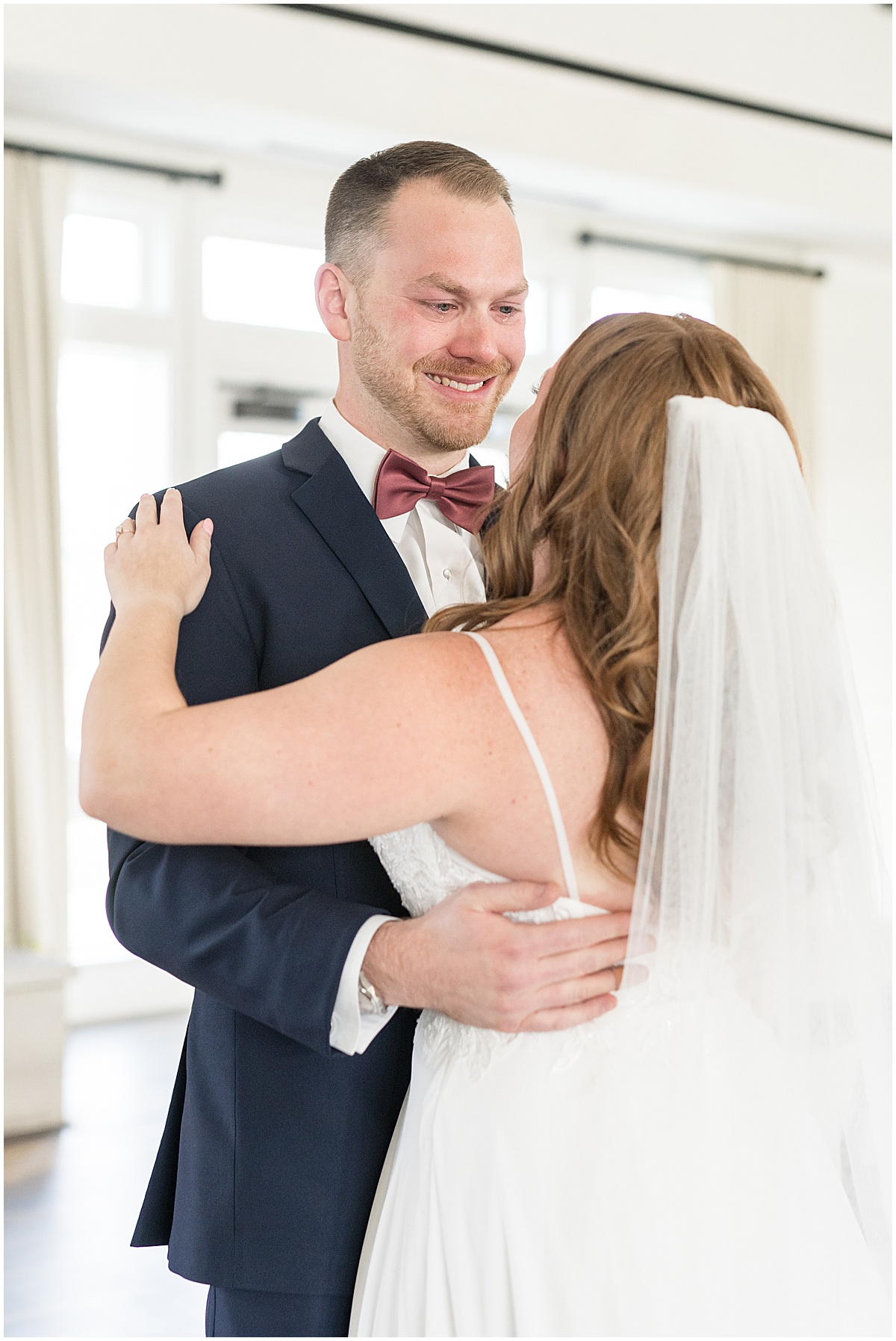 Groom cries when he sees bride at Iron & Ember events wedding in Carmel, Indiana