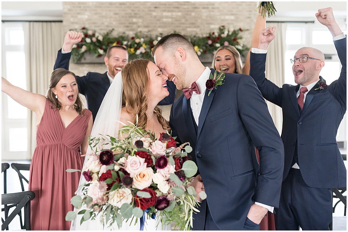 Bridal party celebrates couple at Iron & Ember events wedding in Carmel, Indiana