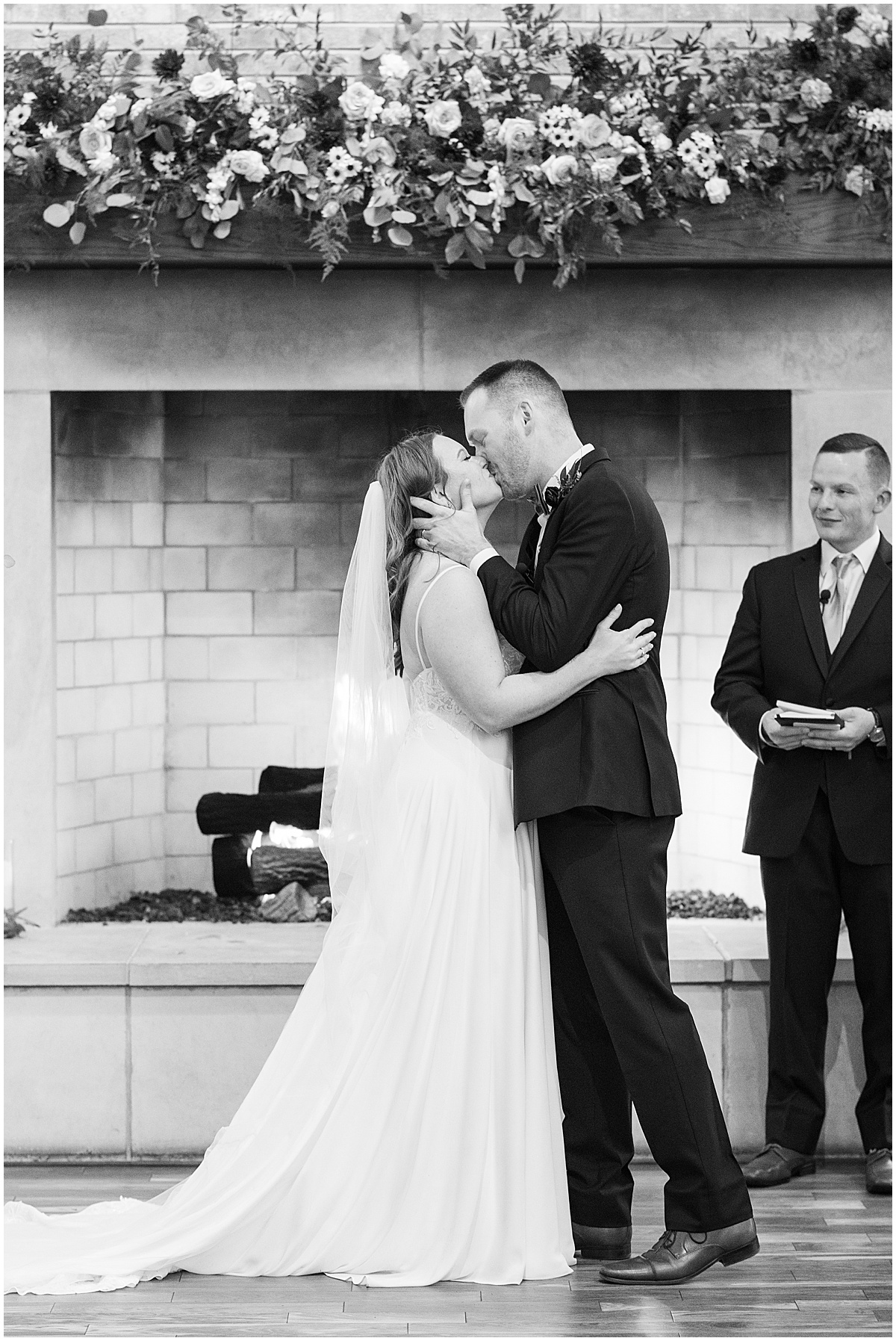Bride and groom kiss at Iron & Ember events wedding in Carmel, Indiana