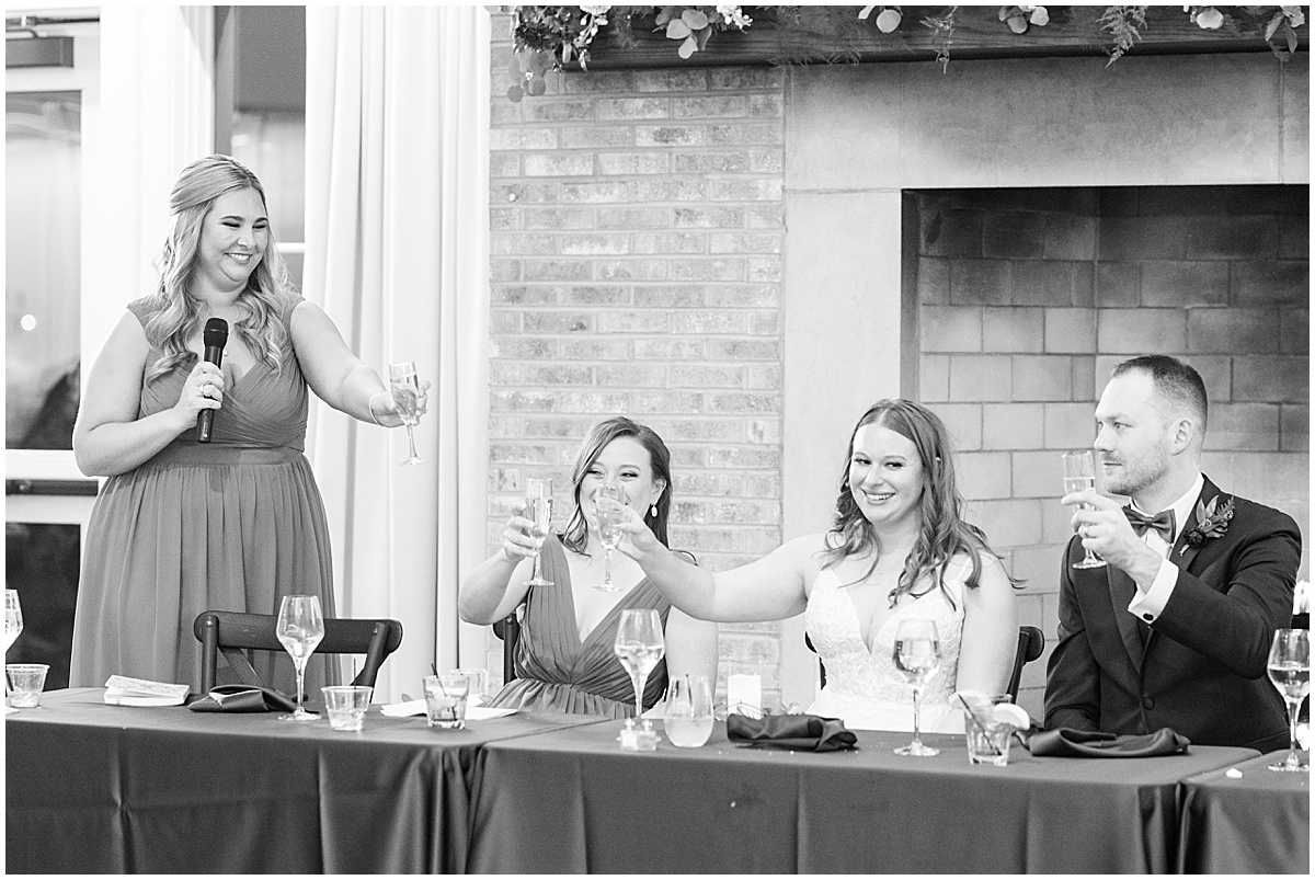 Wedding toasts at Iron & Ember events wedding in Carmel, Indiana