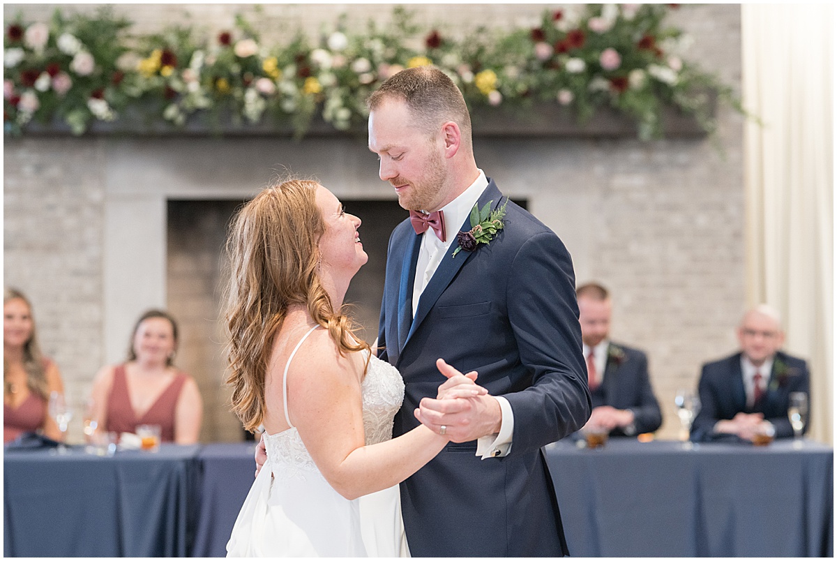 Newlyweds first dance at Iron & Ember events wedding in Carmel, Indiana