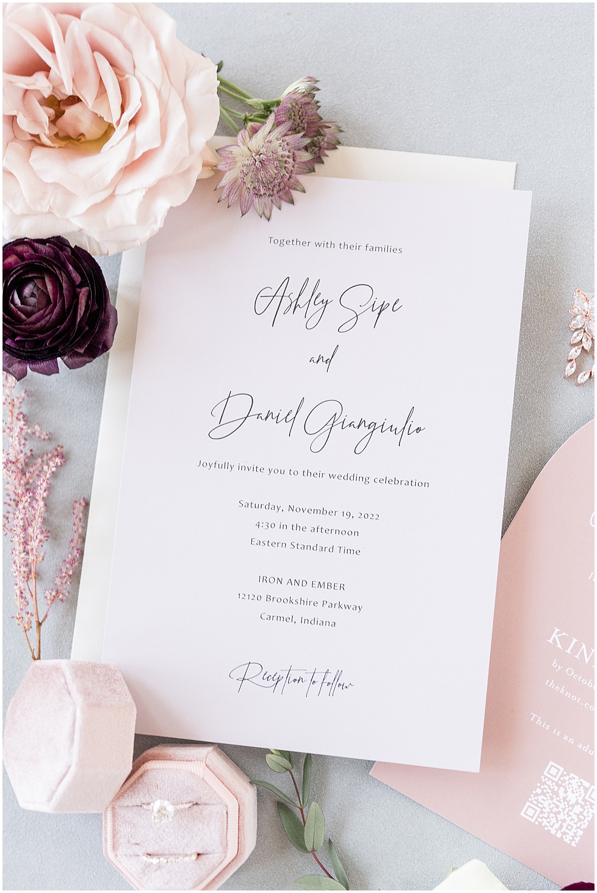 Invitation flat lay for Iron & Ember events wedding in Carmel, Indiana