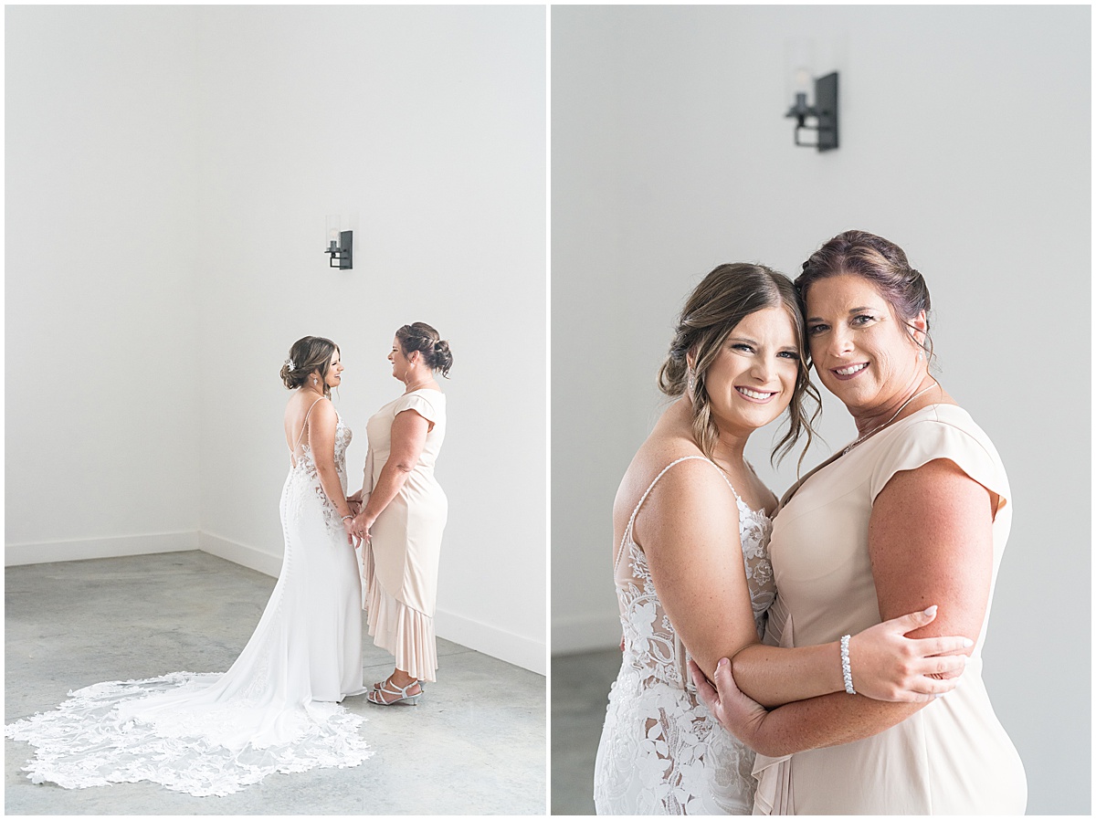 Bride and mother hug before wedding at New Journey Farms