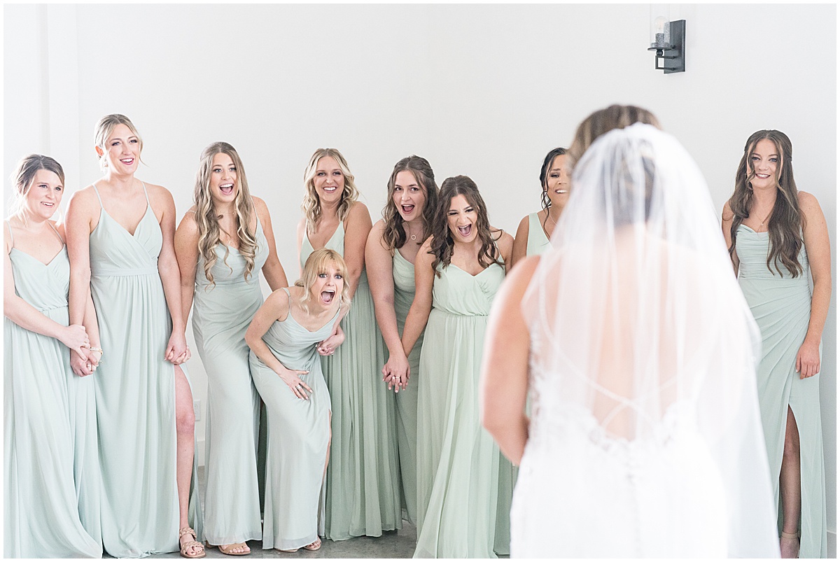 Bridesmaids reaction to bride before wedding at New Journey Farms