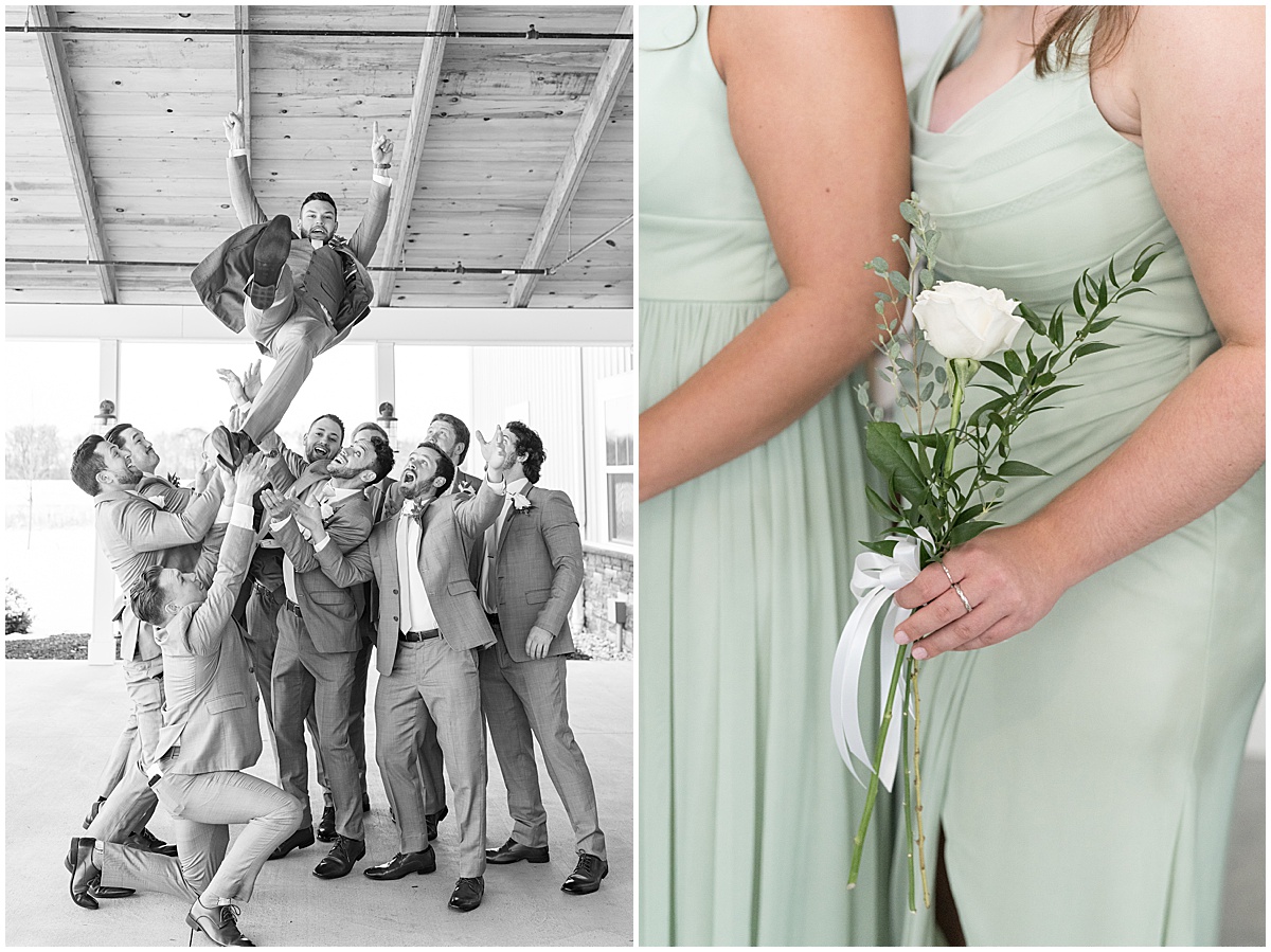 Groomsmen toss groom into the air before wedding at New Journey Farms