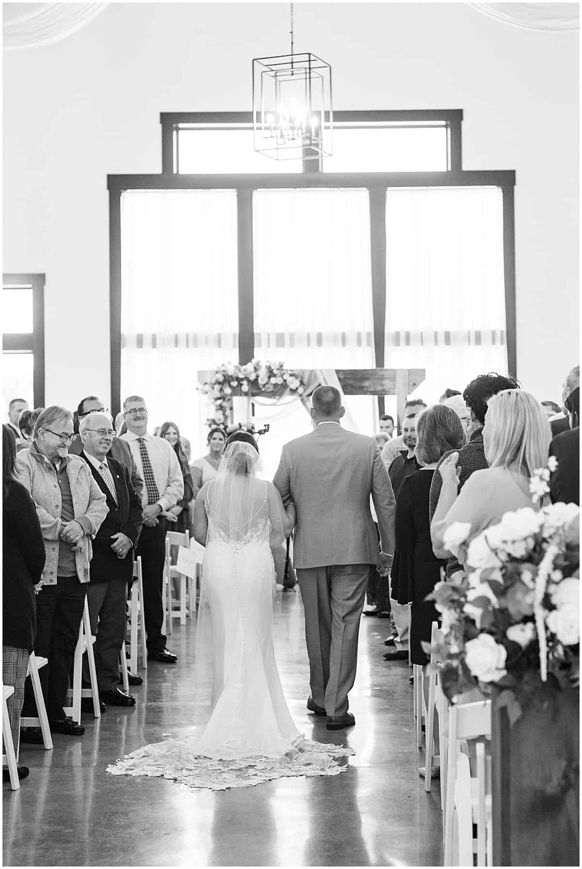 Bride walking down the aisle for wedding at New Journey Farms