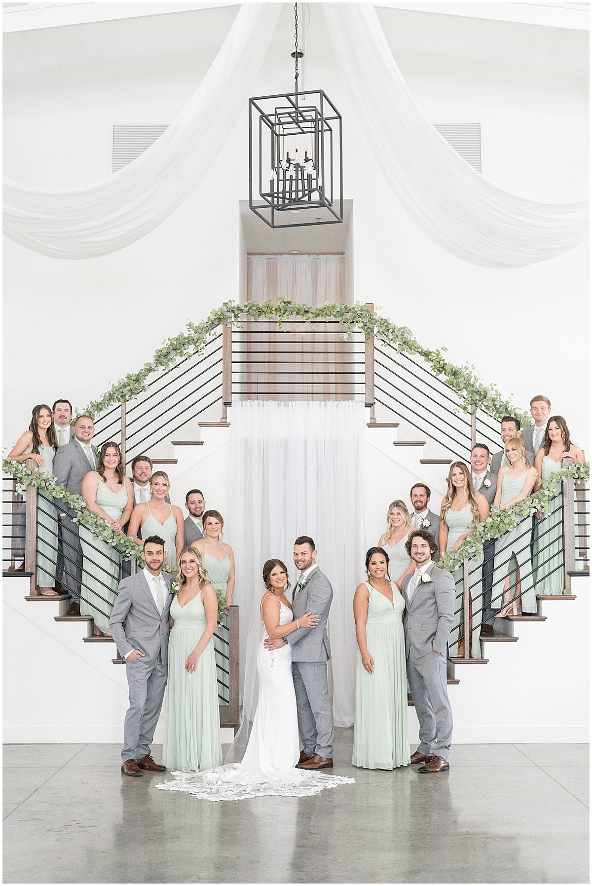 Bridal party on staircase for wedding at New Journey Farms