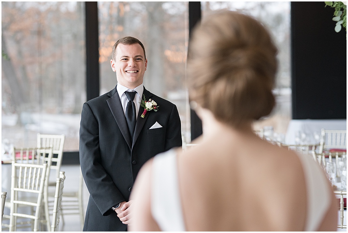 Groom reacts to bride before Allure on the Lake wedding in Chesterton, Indiana