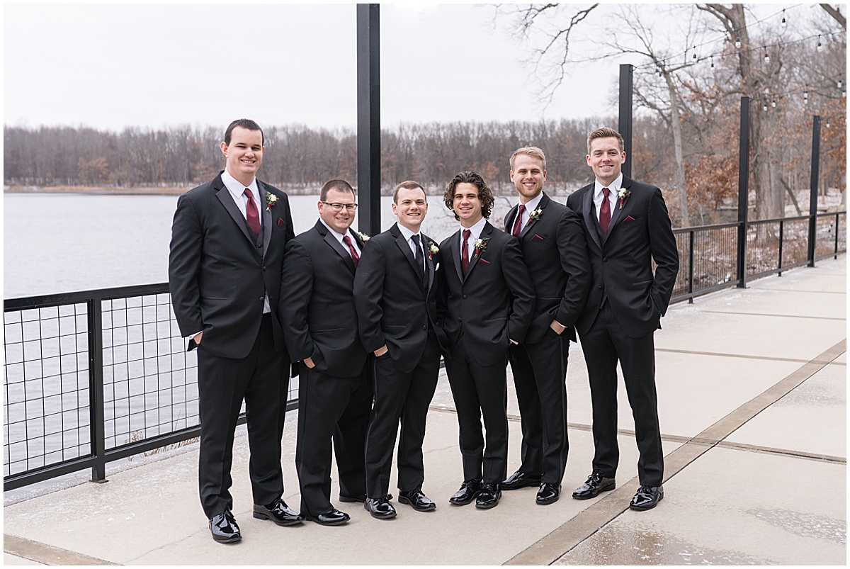 Groom with groomsmen by lake at Allure on the Lake wedding in Chesterton, Indiana