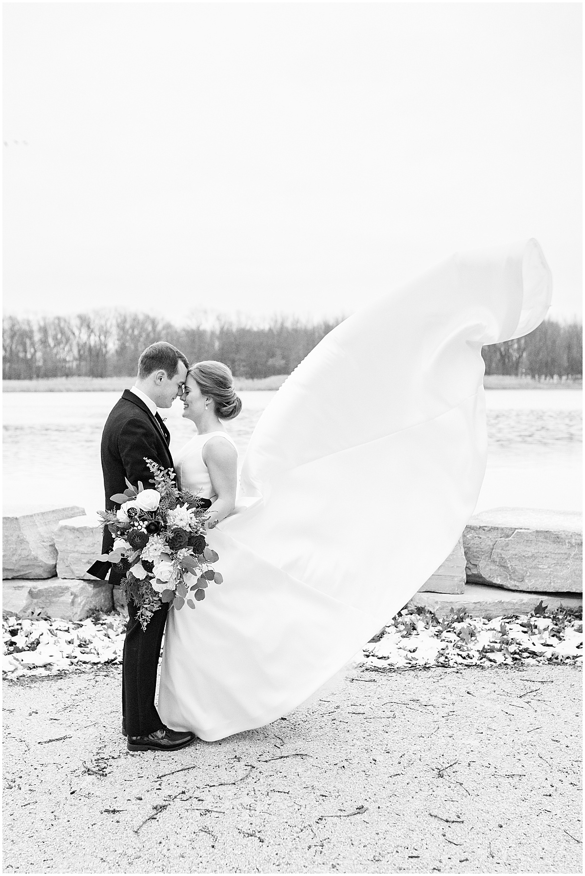 Bridal gown blows in wind after Allure on the Lake wedding in Chesterton, Indiana