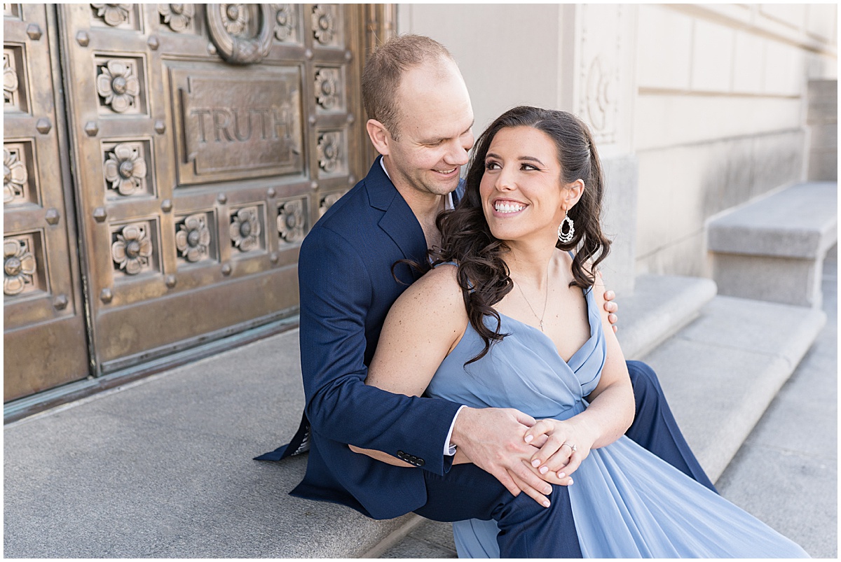 Couple look into each others eyes at Indiana War Memorial during Downtown Engagement Photos