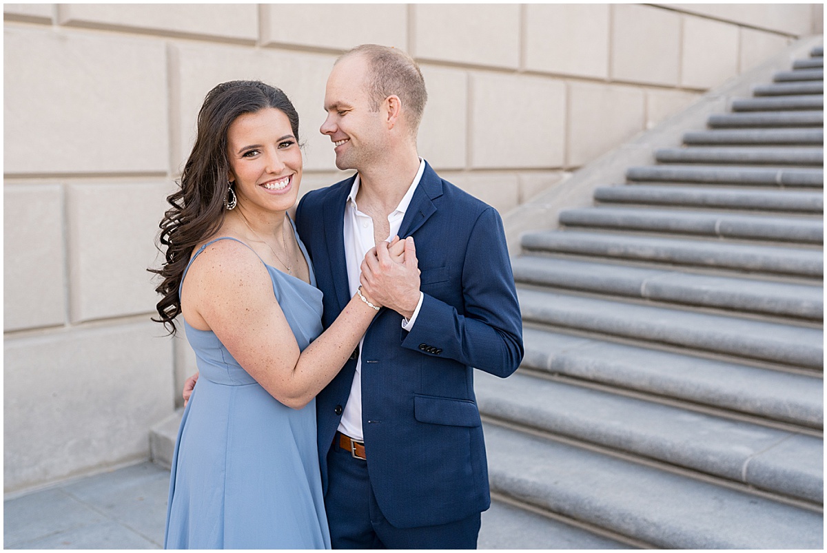 Couple dance by steps at Indiana War Memorial during Downtown Engagement Photos