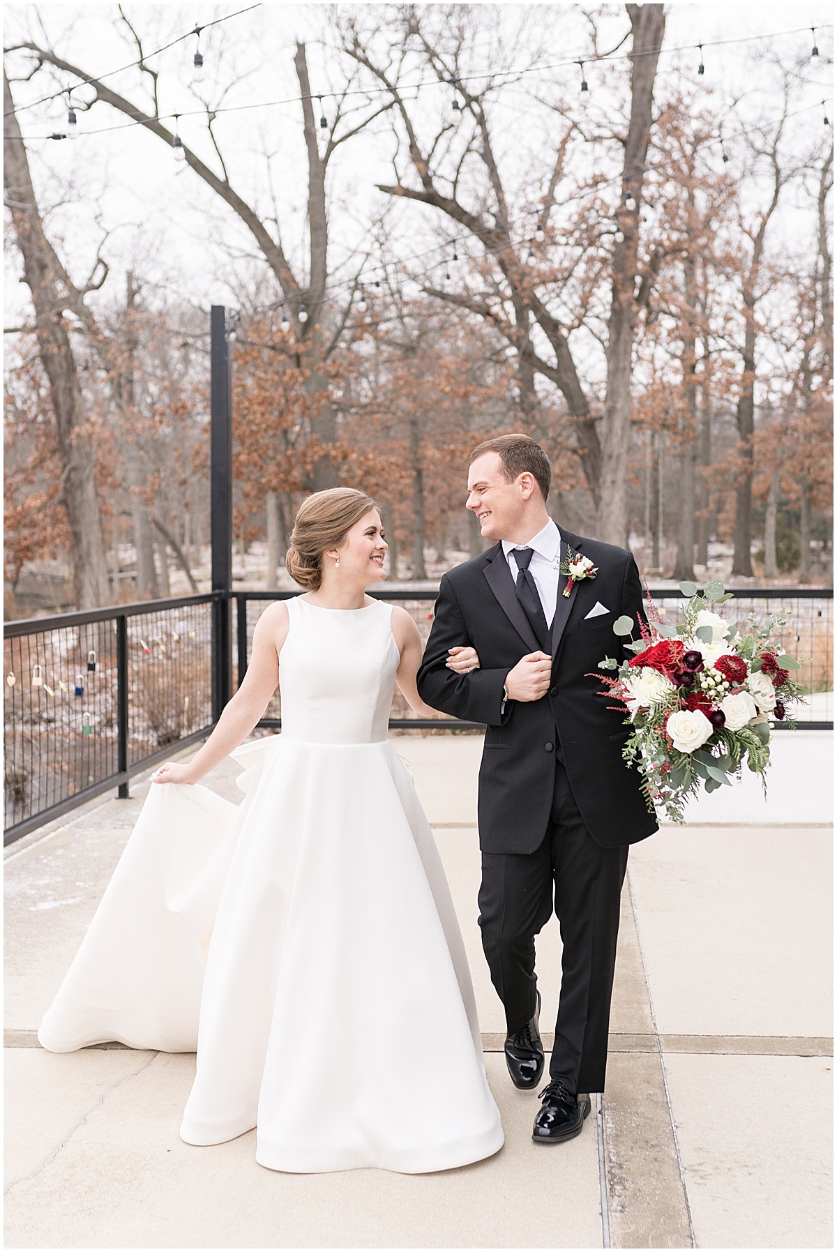 Bride and groom walk outside after Allure on the Lake wedding in Chesterton, Indiana photographed by Victoria Rayburn Photography