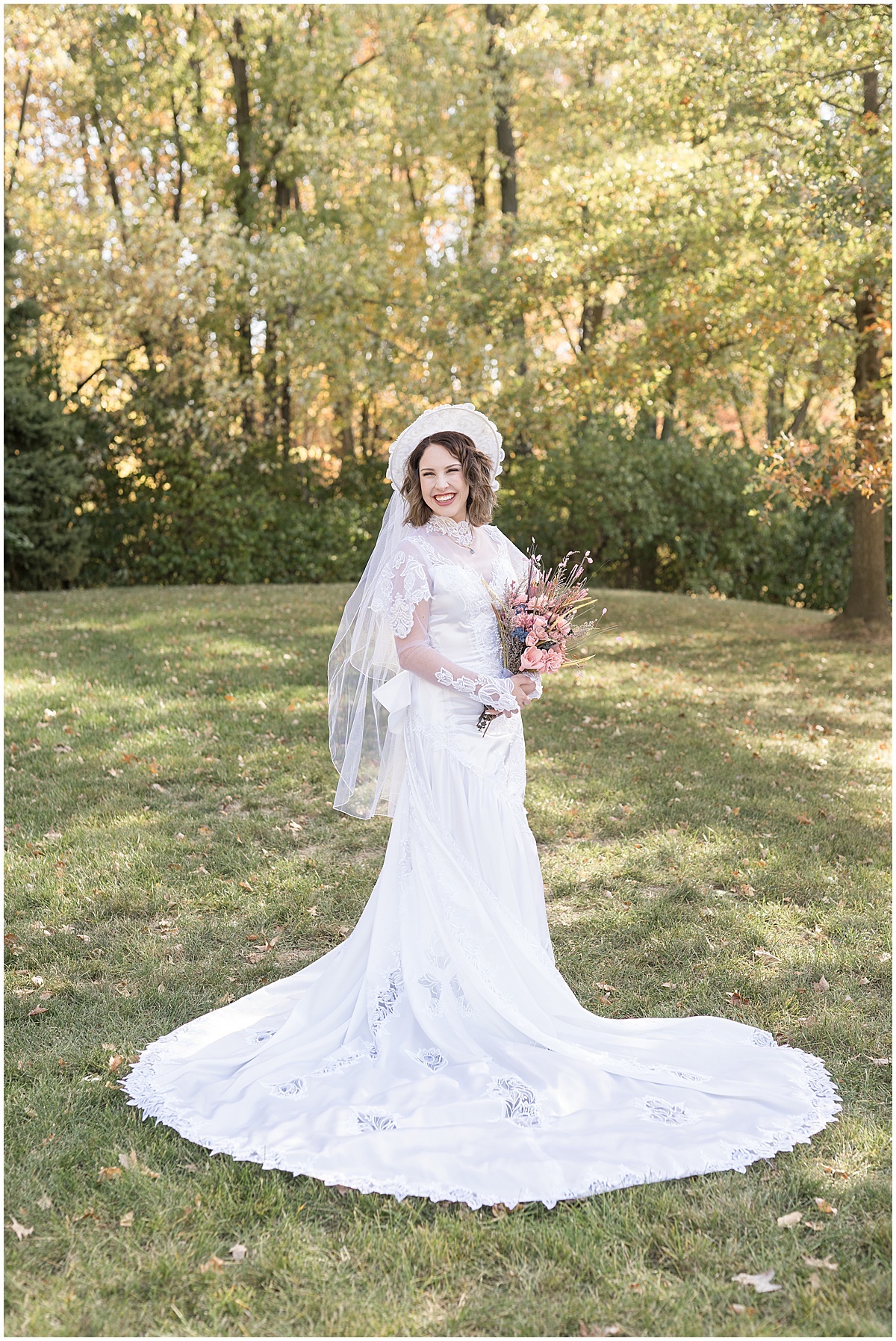 Bride shows off vintage dress for fall wedding at The Rat Pak Venue in downtown Lafayette, Indiana photographed by Victoria Rayburn Photography