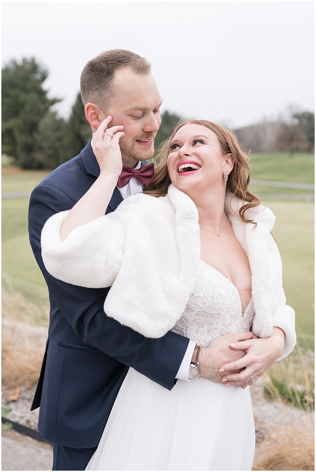 Groom hugs bride after Iron & Ember Events wedding in Carmel, Indiana by Victoria Rayburn Photography