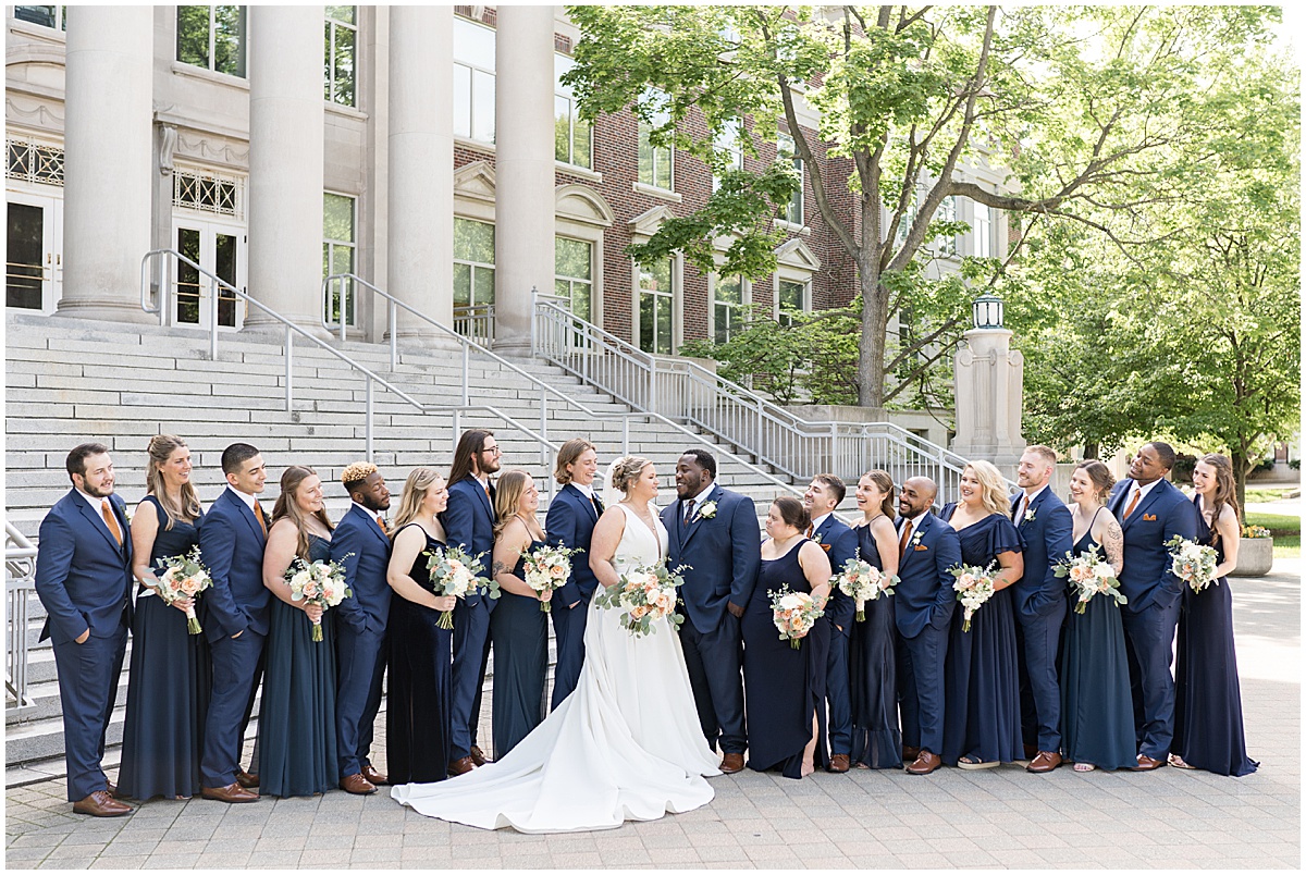 Bridal party admires couples at Purdue Memorial Union wedding photographed by Victoria Rayburn Photography