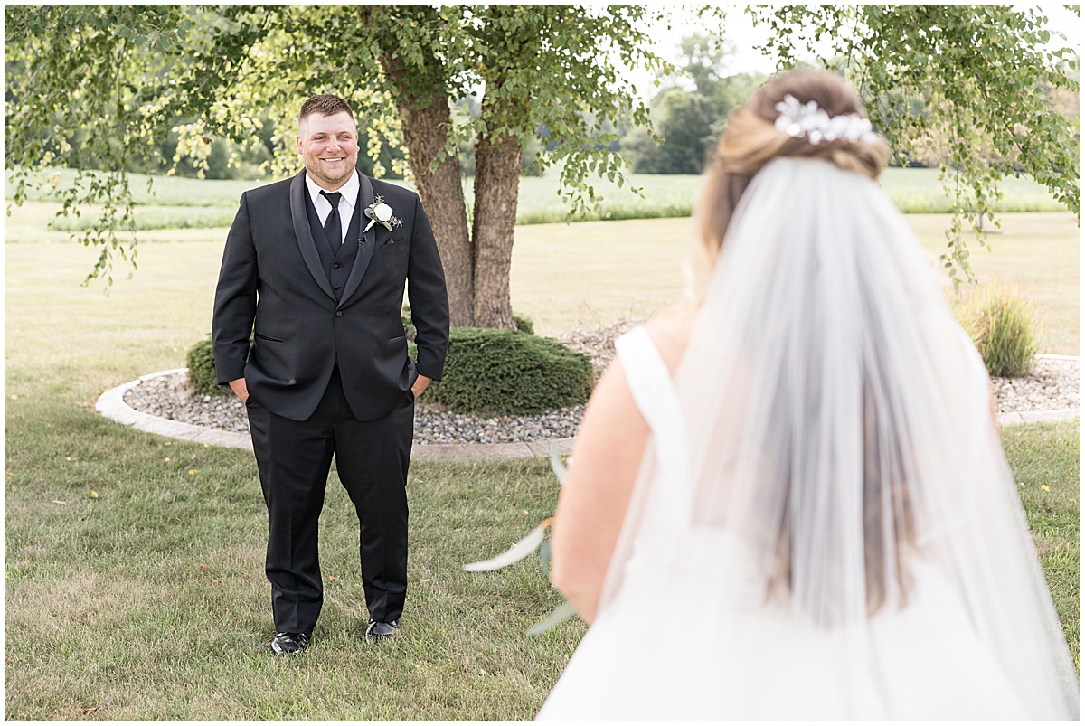 Groom's reaction to bride at wedding in Converse, Indiana photographed by Victoria Rayburn Photography