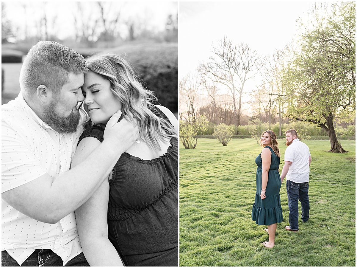 Couple hold hands walking during Holcomb Gardens spring engagement photos