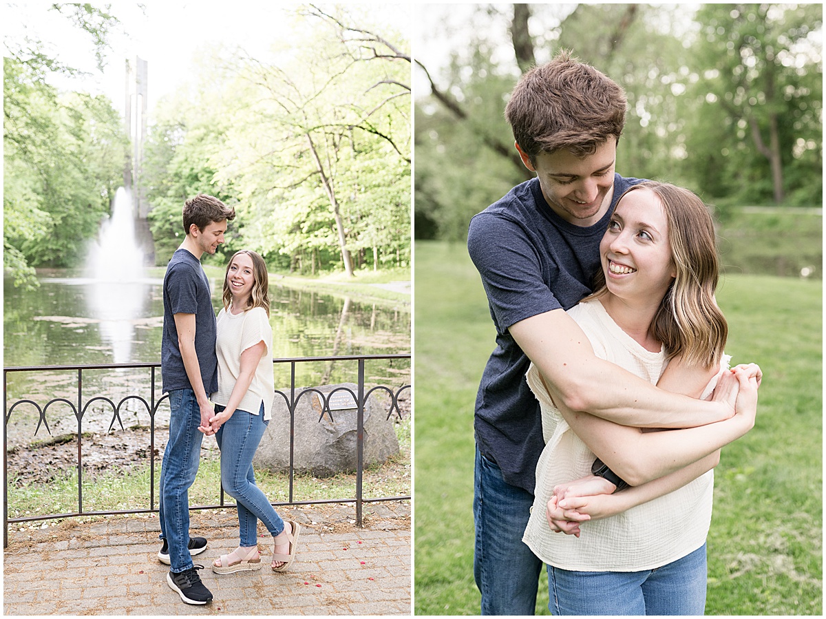 Couple hug during engagement photos at Holcomb Gardens in Indianapolis.