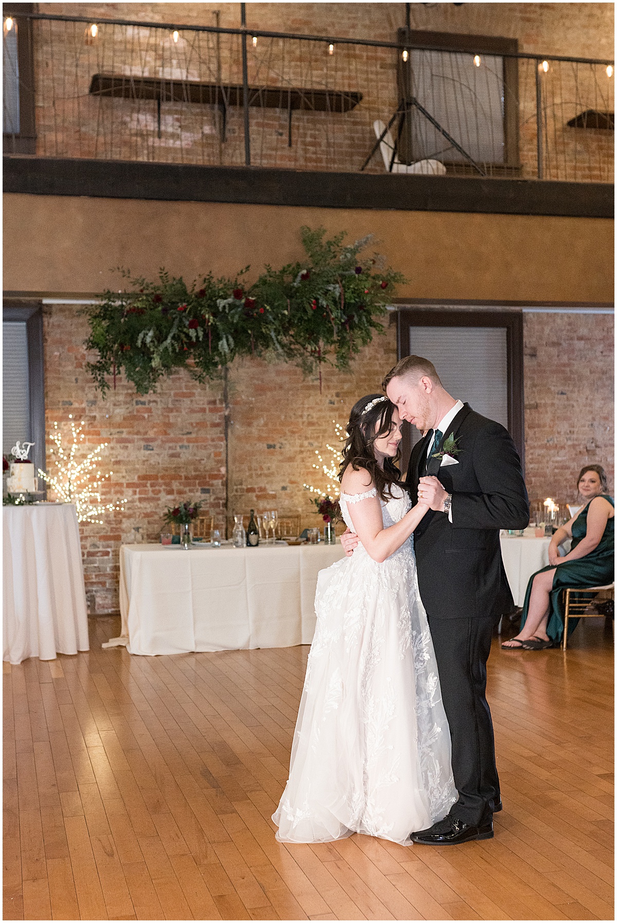 Bride and groom share first dance during Historic Saint Joseph Hall wedding in Indianapolis