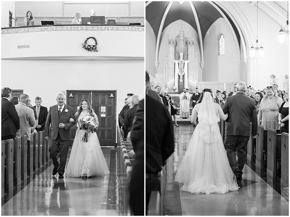 Bride coming down the aisle at wedding at St. Augustine Catholic Church in Rensselaer, Indiana