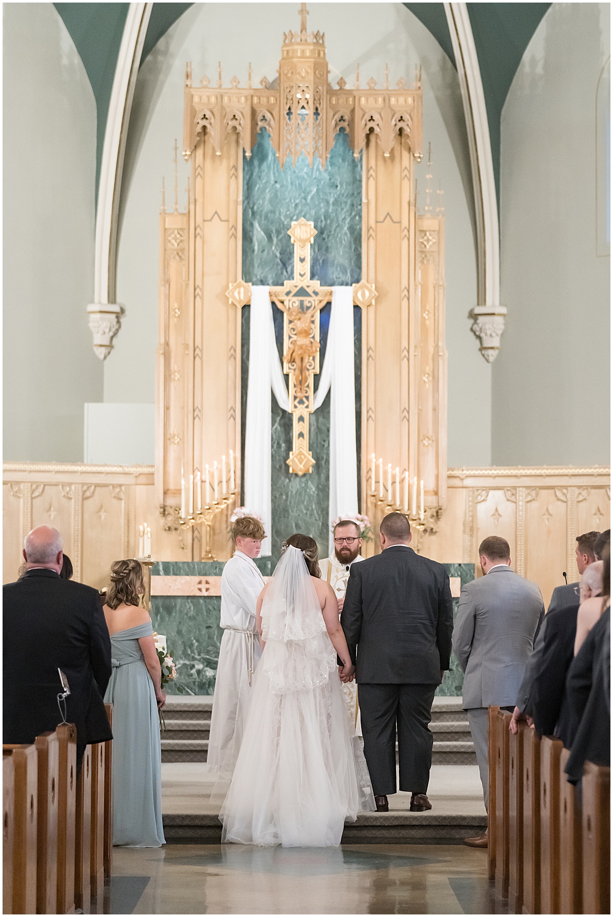 Ceremony of wedding at St. Augustine Catholic Church in Rensselaer, Indiana