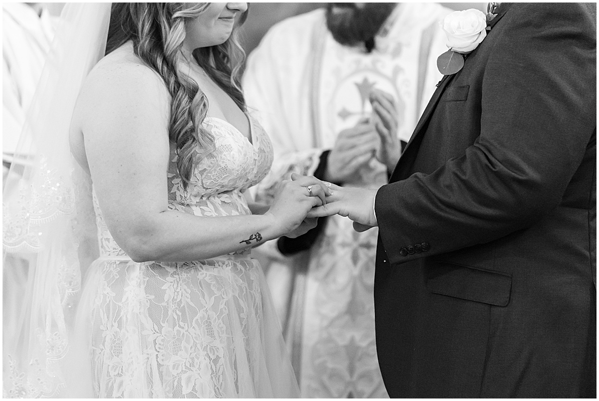 Ring exchange at wedding at St. Augustine Catholic Church in Rensselaer, Indiana