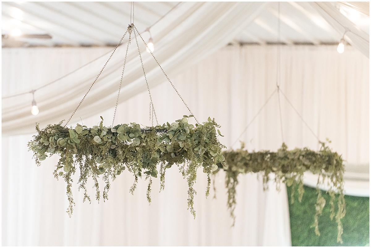 Hanging greenery for Jasper County Fairgrounds wedding reception