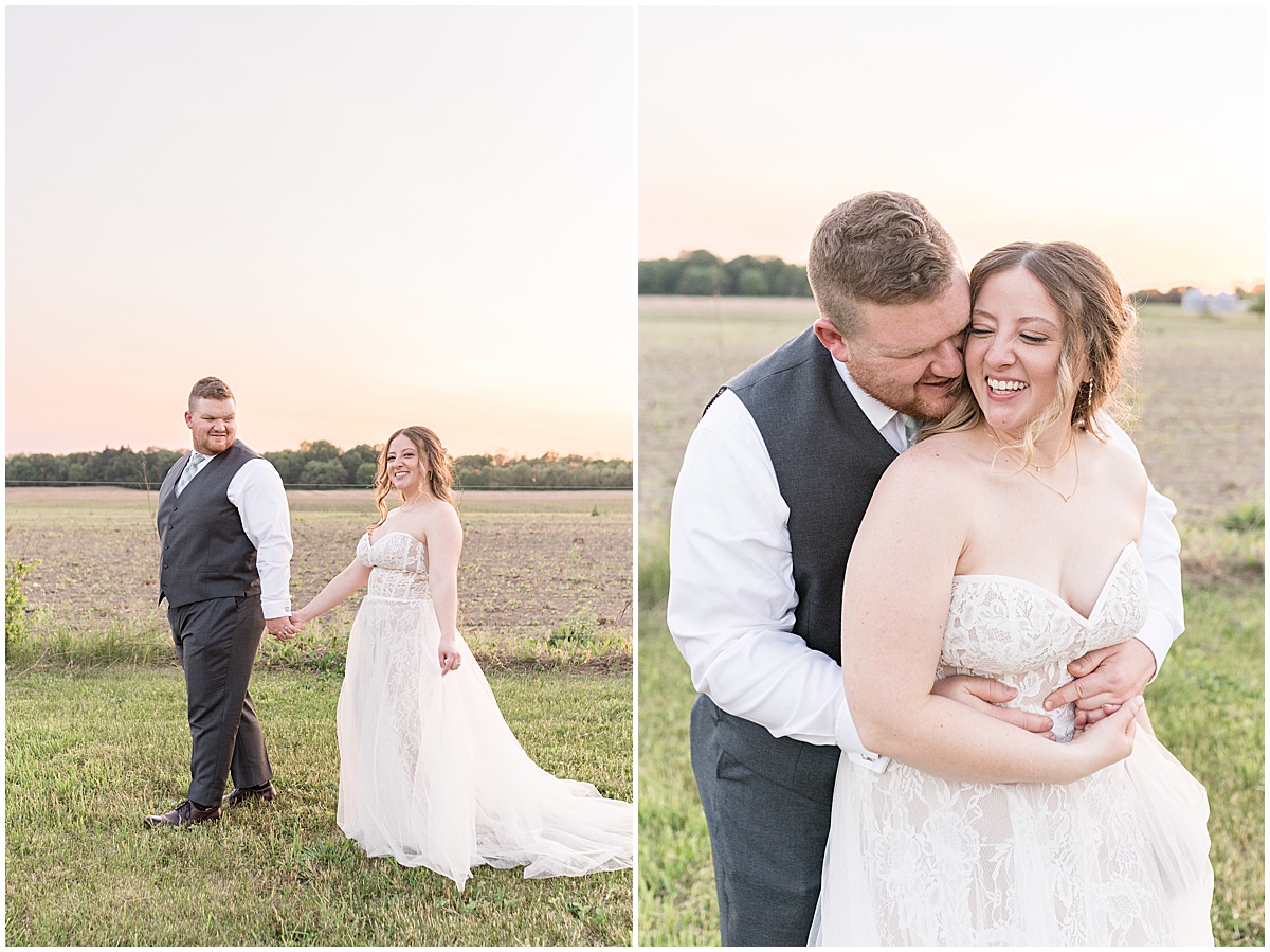 Bride and groom hug in field after Jasper County Fairgrounds wedding
